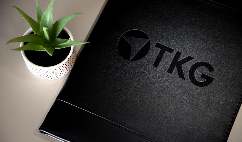TKG portfolio folder icon representing successful digital marketing strategies and measurable business growth in Northeast Ohio